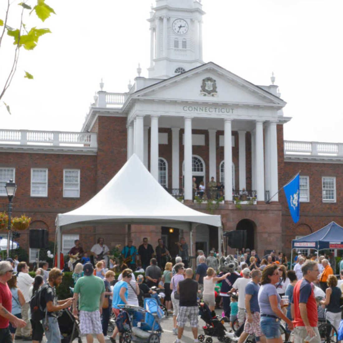 The Connecticut House at the Big E on Connecticut Day, bustling with visitors enjoying the festivities.