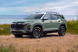 The 2025 Chevrolet Equinox Activ in Cacti Green, conquering the outdoors in style
