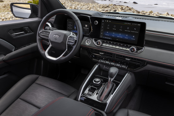 The high-tech infotainment center in the 2024 Chevrolet Colorado, featuring a large touchscreen display and intuitive controls for navigation, entertainment, and vehicle settings