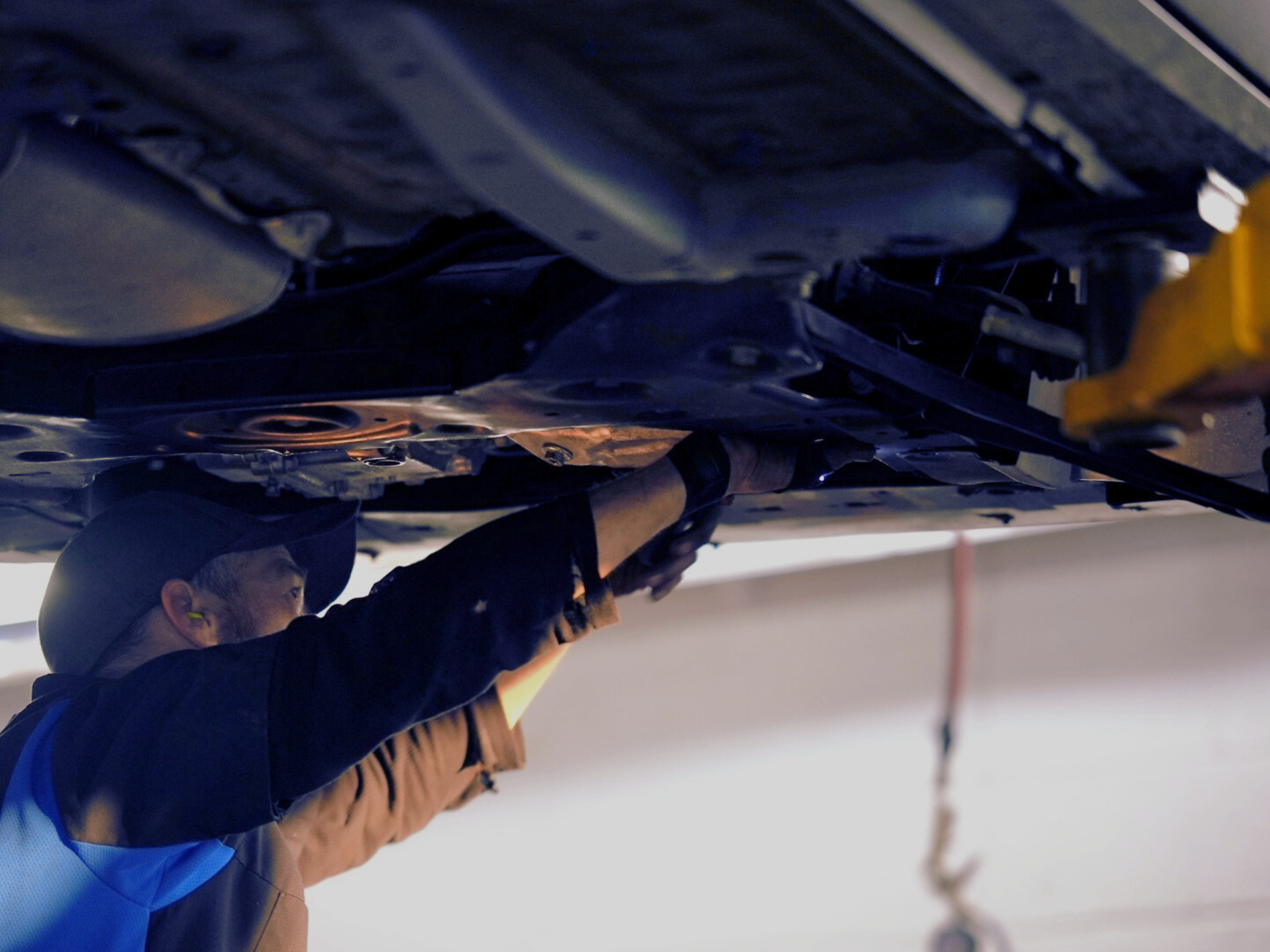 GM Certified Technician performing a Chevrolet oil change in West Springfield